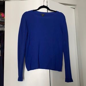 Cobalt blue sweater with ruffle and scallop detail